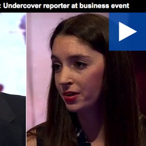 Female undercover reporter at business event. 